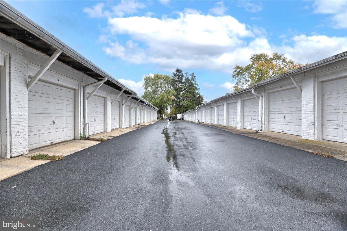 This distinctive property, nestled in the heart of Lancaster City, features 82 storage units on a historically rich site that was once a brickyard dating back to 1900. As Lancaster's population continues to grow, the demand for storage space is steadily rising, making this a prime investment opportunity. The property's strategic location, coupled with the increasing need for storage in the area, ensures it is both a practical and profitable asset. Whether you're looking to grow your real estate portfolio or are ready to make your first investment, this property offers an exciting chance for growth. Units are 18' deep x 9'3" wide. Garage door opening is 7'10" wide x 6'11" high. Units have one overhead light.