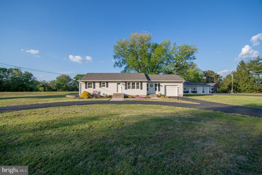 Welcome to this well-maintained 3-bedroom, 1.5-bath home in Delmar, DE, perfectly situated on 1.84 acres with space, updates, and versatility both inside and out. Step through the front door into a comfortable living room that flows into the kitchen featuring stainless steel appliances, a farmhouse sink, and an open connection to the dining area. Just beyond, the breezeway offers flexible space perfect for a playroom, office, or additional sitting area. Down the hall, you’ll find two bedrooms and an updated full bathroom (2024) with a new tub, vanity, LVP flooring, and linen closet. The third bedroom includes exterior access to the backyard. Major updates provide peace of mind, including a new roof in January 2024 with 30–50 year architectural shingles, new HVAC system, ductwork, and insulation in 2025, a new water pump and bladder tank (2025), and a septic pump replaced in 2023. Carpet installed in 2019 is “life/pet proof”, with hardwood flooring underneath most areas (excluding the breezeway, which is concrete beneath carpet). Outside, enjoy the 2-year-old saltwater pool with a pet-friendly liner, 2 oversized blacktop driveways, and a 1-car attached garage. The standout feature is the impressive 30x50 pole building (built April 2021) complete with two 10x10 doors and 6.5-inch concrete floors—perfect for storage, hobbies, or workspace needs. A rare opportunity offering acreage, updates, and outbuilding space all in one!
