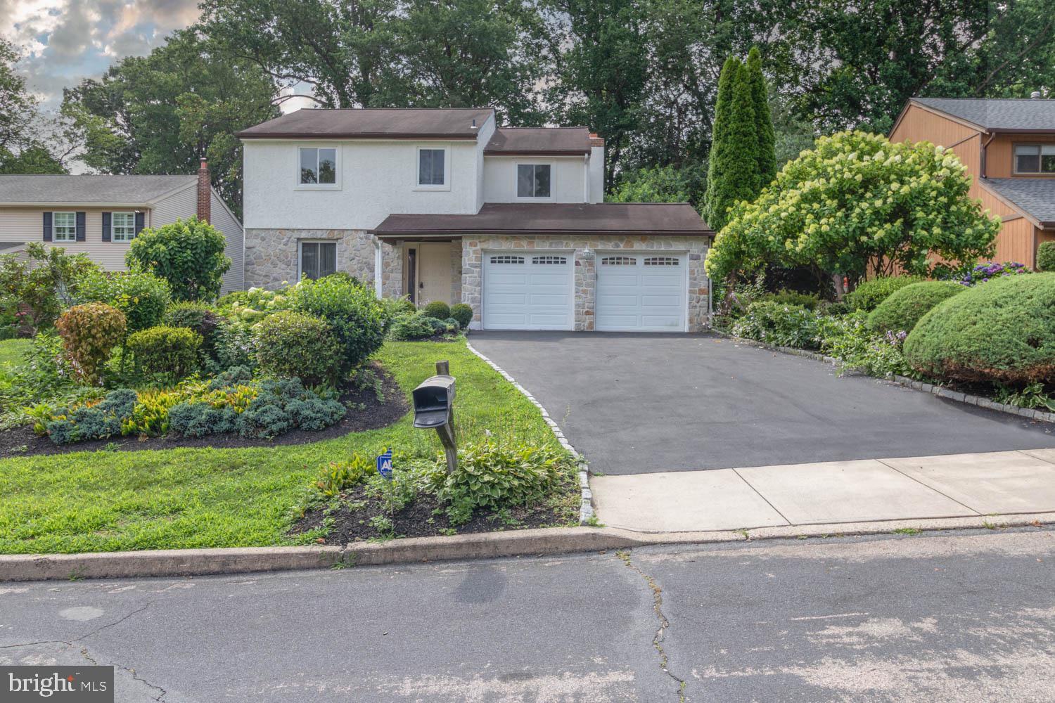 This is a fantastic home! All the upgrades you are looking for....Enter the bright foyer with marble flooring that opens to the Living room with large window allowing the natural light to spread to the diningroom . The updated white kitchen offers granite counters and newer appliances. Lots of space for a eating area all overlooking the warm family room. The family room offers a natural brick wall with wood burning fireplace. New sliding doors access the rear yard and gardens. The yard is a 1/3 of an acre with mature tress and even a peach tree! The space for a backyard oasis is just waiting for you. There are 4 good size bedrooms with great closet space, The two full and one half baths are fully remodeled with high end fixtures. New windows and new flooring thru out the home along with freshly painted and almost 9ft ceilings make this home ready to move in! Location is a short stroll to park,playground ,Wissahickon trails,transportation,shopping and Chestnut hill ! You are going to Love this Home!