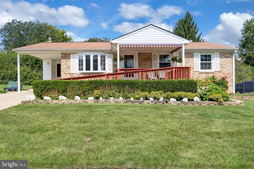 Meticulously maintained 3 bedroom 3 full bathroom rancher in Reisterstown on a large level clear lot. This home has a nice covered carport ( with extra storage)  which is perfect for snowy or rainy days and a beautiful covered front porch.. Wood floors greet you as you enter the home. The living room with a large bay window gives you tons of natural light.  As you walk into the updated kitchen you will notice the 2 year old stainless appliances,  granite countertops as well as a custom kitchen table with the same granite that conveys with the home. Just off of the kitchen is a cozy family room addition with heated porcelain floors and a gas fireplace. .There are 3 generous sized bedrooms on the main level including a bedroom which connects to a large bathroom with a shower wide enough for a wheelchair to roll right into. The master bedroom has a walk in closet, bathroom and fireplace.  The layout allows each bedroom to have their own bathroom  ( third bedroom uses the full hall bathroom)  The lower level is clean and organized. It includes a workshop, laundry room and plenty of space for your perfect rec room.  A walk out takes you right to the back yard where you will find a concrete basketball court , patio and shed. The back of the home also features heated gutters to prevent ice from causing ice dams.  Along with the highly maintained grounds there are hundreds of perennial flowers that bloom in the Spring, Summer and Fall.   Very rarely do you find a home so well taken care of!