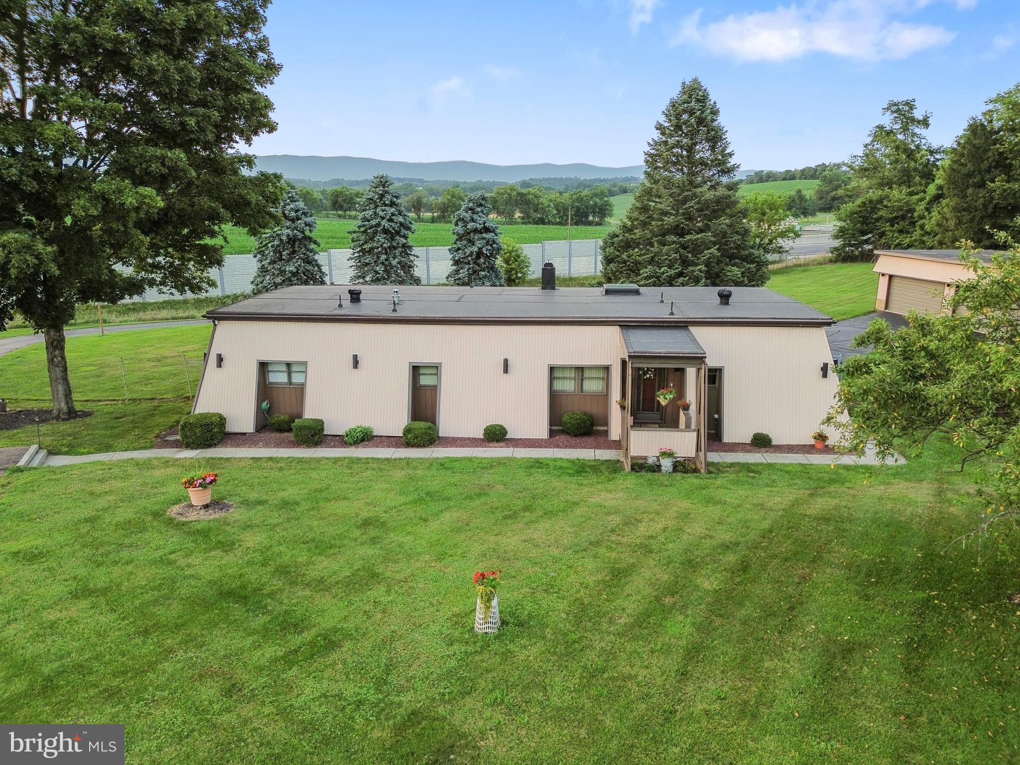 Very unique home that sits on 1.84 acres in Carlisle, Big Spring Schools with a 4 car garage and enough room to park another 10+ cars!!! This is a mobile home that had a stick built addition in 1982 that looks like a fortress! One floor living including primary suite with a full bathroom, formal dining room, central AC. Fenced in private back yard that backs up to the PA turnpike giving easy access to commute in either direction! Cash or portfolio lenders only please unless you can verify your financing will not require a title!!!! Set up your showing TODAY!!!!