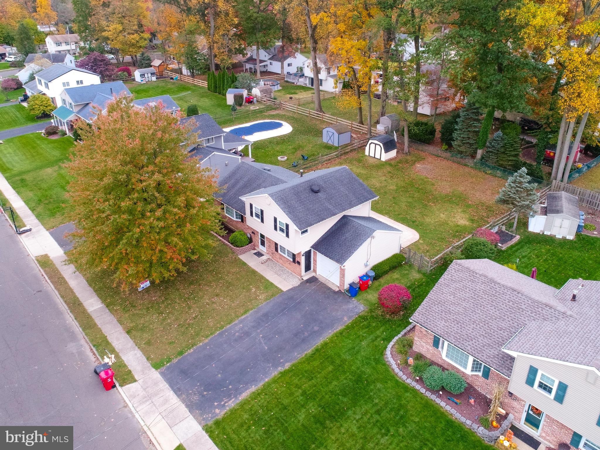 Charming, split level home in absolute move in condition, entrance foyer with large closet. Family room with OE to large fenced yard. Bonus office room. Modern kitchen with 48" maple cabinets, pantry, recessed lights. Dining room, living room with bay window. Laundry room with OE double wide driveway sidewalks. 2 attics.