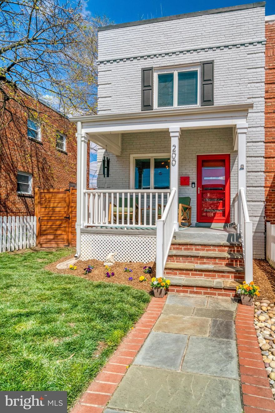 This is your chance to buy one of the best homes in Lynhaven.. Surrounded by a quintessential white picket fence the inviting south facing front porch beckons you to sit and enjoy morning coffee with the neighbors. Step inside to tour the sun washed open floor plan where the living room flows seamlessly into the gourmet eat-in kitchen featuring a large island, soft white cabinetry, granite counters, stainless appliances and sparkling jade tiled backsplash.  The beautiful separate dining room addition with warm wood fireplace is perfect for casual meals or large family gatherings. Upstairs you'll find two ample sized bedrooms including the primary with extra closet space and recently refreshed full hall bathroom. Your guests will appreciate the lower level  with newly carpeted recreation room. wet bar and beverage cooler, updated full bath plus a 3rd bedroom or private  home office. This corner lot offers more space for outdoor entertaining on the spacious paver patio, raised bed gardening or tinkering  in your very own two car garage. The location can't be beat just a short stroll to the "Avenue", Potomac Yards shopping center and Metro. VA TECH new campus, Amazon, Airport, Pentagon , DC and Mount Vernon Bike Trail within minutes.
