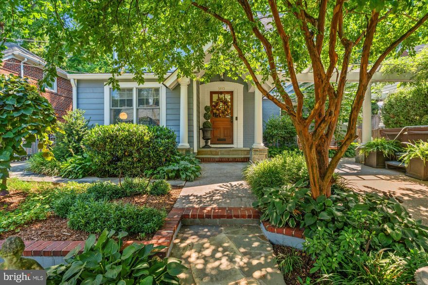 Period details meet chic style in this renovated and expanded 1929 Colonial.  Made for entertaining! Del Ray/Mt. Ida/Beverly Hills North area. Abundant curb appeal. Front picket fence & lush cottage garden charm. Mature magnolia, crepe myrtles, lilacs and fig frame wisteria-draped pergola, inviting porch swing, and welcoming covered entry. Elegant foyer, formal living room w/ wood burning fireplace, office, mudroom and stylish 3/4 BA powder room on entry level lead to side patio. Expanded open plan 2nd level. Designer chef's kitchen (featured in several design publications) showcases Wolf oven, Sub Zero fridge, large marble countered island, wine fridge, coffee station, and banquet seating in eat-in kitchen. Kitchen flows into open plan family room w/ cozy gas fireplace, additional sunlit sitting area, and formal dining area with live-edge wood bar.  Primary bedroom overlooks rear garden and features vaulted ceilings and newly renovated en suite bath and two owner's closets. Three additional bedrooms, 2nd full bath, and laundry also on upper levels.  Basement level features screening room and expansive basement storage. Rear garden showcases gorgeous artisanal crafted hand-cut stone patio and terraced retaining walls with lush landscaping, and custom storage shed/art studio installed by current owners complementing existing mature tall oaks. Tons of updates just minutes from Reagan Airport, three metro stations, Del Ray and Mount Vernon Avenue, Old Town, the Pentagon, and DC.