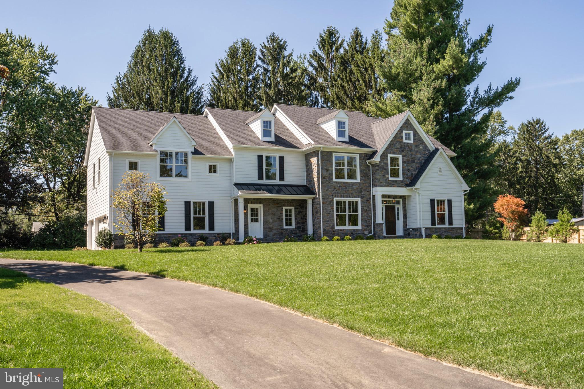 Just Completed! 408 Black Swan Lane Berwyn is a new construction home situated on a bucolic, and serene one acre lot, located within the award winning Tredyffrin-Easttown School District. Grace and refinement define this must-see home. Mature trees and a private terrace in the rear offer a wonderful place within which to relax and also entertain with a privacy fence and professional landscaping. The large entryway opens to the Den, Dining room with Wainscotting, and Wet Bar with custom cabinetry, marble tile, and wine cooler. An ample coat closet, and formal powder room make this area complete to welcome family and guests. Light spills through the kitchen with oversized windows and decadent custom cabinetry with glass doors, with oversized island, hand-made tile backsplash, quartz countertops, and professional grade Bosch appliances and walk-in Pantry. The morning room overlooks the private, rear yard with mature landscaping and flagstone patio. The mudroom area boasts of ample storage with built-in cabinetry, coat rack, and shelving and informal powder room with brick tile flooring. The family room is a place of comfort and gathering with abundant built-in cabinetry, Coffered Ceiling, and a large gas fireplace with honed marble surround. French doors open to the large home office or home library. Voluminous 9 foot ceilings, an open concept floor plan, and site finished oak hardwood flooring throughout the first floor make this space modern and accessible. The second floor Master Bedroom offers natural lighting and beautiful views, tray ceiling, and oversized his and her walk-in closets. The lavish master bathroom is adorned in Calacatta marble, crystal light fixtures throughout, soaking tub, dual vanities, and over-sized dual head shower with marble niche, and glass surround enclosure. Four additional bedrooms are located on the second story, a Jack and Jill bedroom with a study room/flex room situated on one end of the hallway, and two other bedrooms with dedicated bathrooms and oversized closets and second story laundry. The finished lower level offers many opportunities to be configured to fit a homeowner's dream layout with abundant area for storage, and two large windows offering natural daylight. The three car garage with 10 foot high ceilings finishes this beautiful new construction home by award winning CD Hall Builders. This exquisite property is minutes to Paoli Train Station for an easy commute to Philadelphia and NYC, close to Lancaster Avenue with it's amazing array of shopping and dining options, and close to all major roadways. Call today to preview this home!