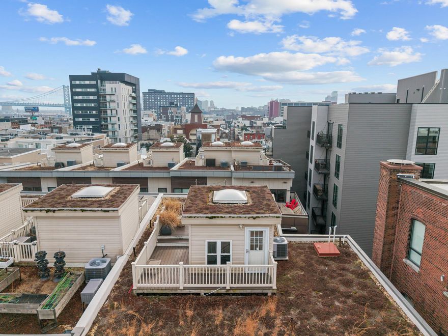 A Rare First Offering. 
A privately curated, custom end-unit masterpiece in one of Philadelphia's most coveted architectural enclaves, freshly refreshed and ready for its next chapter.

Welcome to 822 North American Street, Unit 6. An extraordinary five-story luxury townhome set within an exclusive nine home enclave in the heart of Northern Liberties. Offered for the very first time, this custom end unit residence was conceived with exceptional intention and executed without compromise. Now immaculately refreshed throughout, it presents a rare canvas for the discerning buyer who demands the very best.

Spanning approximately 4,200 square feet across five thoughtfully designed levels, the home commands six bedrooms, five full bathrooms, and one half bathroom. A private elevator services every level, and a dramatic two tier staircase connects each floor with architectural intention, creating a sense of arrival at every level.

The floor plan is a masterclass in flow and scale. The entry level welcomes you with a generous living area, a ground floor bedroom with private ensuite bath, and direct access to a private patio. One floor up, the second level opens into the heart of the home: a chef's kitchen, open dining and living space, a half bath, and a private balcony. The third level is devoted to the primary suite with a spa inspired bathroom, alongside a second bedroom with its own private bath, a balcony, and dedicated laundry. The fourth level delivers an expansive upper living space and three additional bedrooms, one ensuite, two sharing a hall bathroom. And crowning it all a sweeping rooftop deck with commanding Philadelphia skyline views.

A secured two-car garage, private elevator, keyless entry, intercom and security systems, and premium finishes throughout complete a home that has anticipated every need before you knew to ask.

As the end unit within this exclusive enclave, Unit 6 offers the privacy and architectural presence befitting a residence of this caliber  In the heart of Northern Liberties' celebrated dining, boutique retail, parks, and transit, and just minutes from Center City.

Freshly painted and refreshed throughout. Offered for the very first time. An opportunity that will not come again.