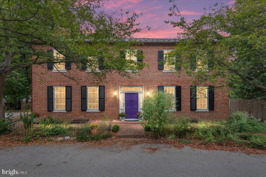 The Abraham Shepherd Home – A Rare Blend of History, Elegance & Modern Comfort

Built in 1759, the Abraham Shepherd Home is one of the oldest and most iconic residences in West Virginia. Tucked into the heart of Shepherdstown—West Virginia’s oldest town—this distinguished property offers a seamless blend of historic grandeur and thoughtful modern updates, including rare off-street parking—a significant advantage in the historic district.

Original heart pine floors, hand-crafted woodwork, deep window insets, and five decorative fireplace mantels preserve the soul of the home, while a series of tasteful renovations bring it into the present day with style and comfort. The layout has been enhanced for today’s living, including a reimagined family room, a stunning dining space perfect for entertaining, and an expansive picturesque kitchen.

Modern updates continue throughout the home, including updated bathrooms, mechanical systems, and a custom master bedroom suite. The light-filled library boasts floor-to-ceiling shelving, ideal for displaying books and cherished collections. Upstairs are five bedrooms, two full baths, and a cozy sitting area, all featuring original wood floors.

Outside, the home sits on a third of an acre—a generous lot that feels like a private retreat, with brick patios, mature landscaping, and the soothing sound of Town Run flowing past the neighboring Grist Mill. A preserved smokehouse offers space for storage, gardening, or creative use.

Located just two blocks from the Potomac River and minutes from the C&O Canal and Appalachian Trail, this historic home is a rare offering—rich in character, updated for comfort, while maintaining its 18th century charm

Near the Potomac River and the C&O Canal and Appalachian Trail, this historic home is a rare offering - updated for modern comfort, while maintaining its 18th century charm.
Come experience the Abraham Shepherd Home—where the best of the past meets the ease of today in beloved Shepherdstown, West Virginia.

2023 updates: new insulated metal roof; plumbing; electric; master bathroom w/heated floors, soaking tub and sauna; laundry room; storm windows and gutters; new and updated HVAC; whole house water filter; 4-car driveway w/EV electric hookup; extra pantry and closets; mudroom entry w/work sink; all new kitchen and laundry appliances with transferable full-service warranty until October 2027.