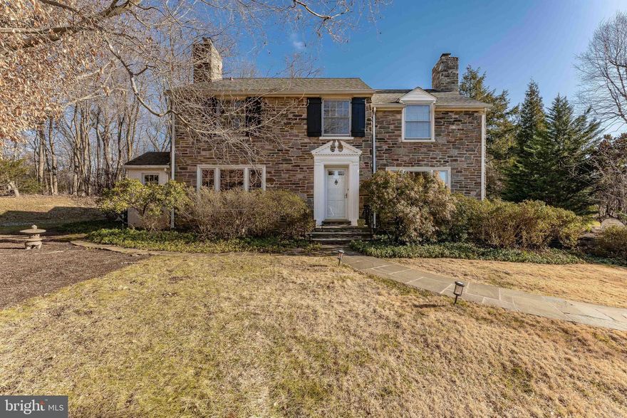 Welcome to 249 Bell Road, an elegant 4-bedroom, 2-full and 2-half bath single-family residence set on a private road in Wynnewood. Thoughtfully designed with generous living spaces and timeless finishes, this home offers comfort, functionality, and classic Main Line appeal. A welcoming foyer with hardwood floors sets the tone upon entry, opening to the formal living room featuring hardwood flooring, a wood-mantel fireplace, and French doors that lead to the screened-in porch. The adjoining dining room continues the hardwood floors and showcases a bay window, chandelier, and direct access to the porch—creating a seamless flow for entertaining. The screened-in porch is a true highlight, offering flagstone flooring and a ceiling fan, making it an ideal space for relaxing or hosting guests in every season. A private home office provides a quiet workspace with built-in cabinetry, carpeted floors, and both interior access and a separate exterior entrance. The eat-in kitchen offers a comfortable space for casual dining and is well-appointed with tile floors, built-in cabinetry, granite countertops, a center island, an electric cooktop, double ovens, a Sub-Zero refrigerator, double sink, and a triple window overlooking the backyard. Adjacent to the kitchen, the family room includes carpeted floors, a vaulted ceiling, built-in cabinetry, and sliding doors that open to the flagstone patio and yard—perfect for indoor-outdoor living. Also on the main level is a laundry area with tile floors and a large walk-in shower, along with a powder room finished with limestone floors and a marble vanity. Upstairs, the primary suite offers a peaceful retreat with carpeted floors, two closets, and an en-suite bath featuring marble floors, a walk-in closet, a walk-in steam shower, and two single sink marble top vanities. Two additional bedrooms with carpeted floors provide comfortable accommodations for family or guests. A full hall bath includes tile flooring and a tub/shower combination with a jetted tub. A cedar closet in the hallway offers ideal storage for seasonal or delicate items. The fourth bedroom includes a bonus space and access to the walk-up attic, adding flexibility for future use. A cozy reading nook completes this level, providing a quiet corner to unwind. The finished walk-out lower level expands the living space with a recreation room featuring tile floors—ideal for a media room, home gym, or playroom. This level also includes a powder room, access to the garage, and the home’s utilities.Ideally located near local shopping, dining, and everyday conveniences, with easy access to I-76, this home offers the perfect blend of privacy, space, and accessibility. 249 Bell Road presents a rare opportunity to enjoy gracious living in one of Wynnewood’s most desirable locations.