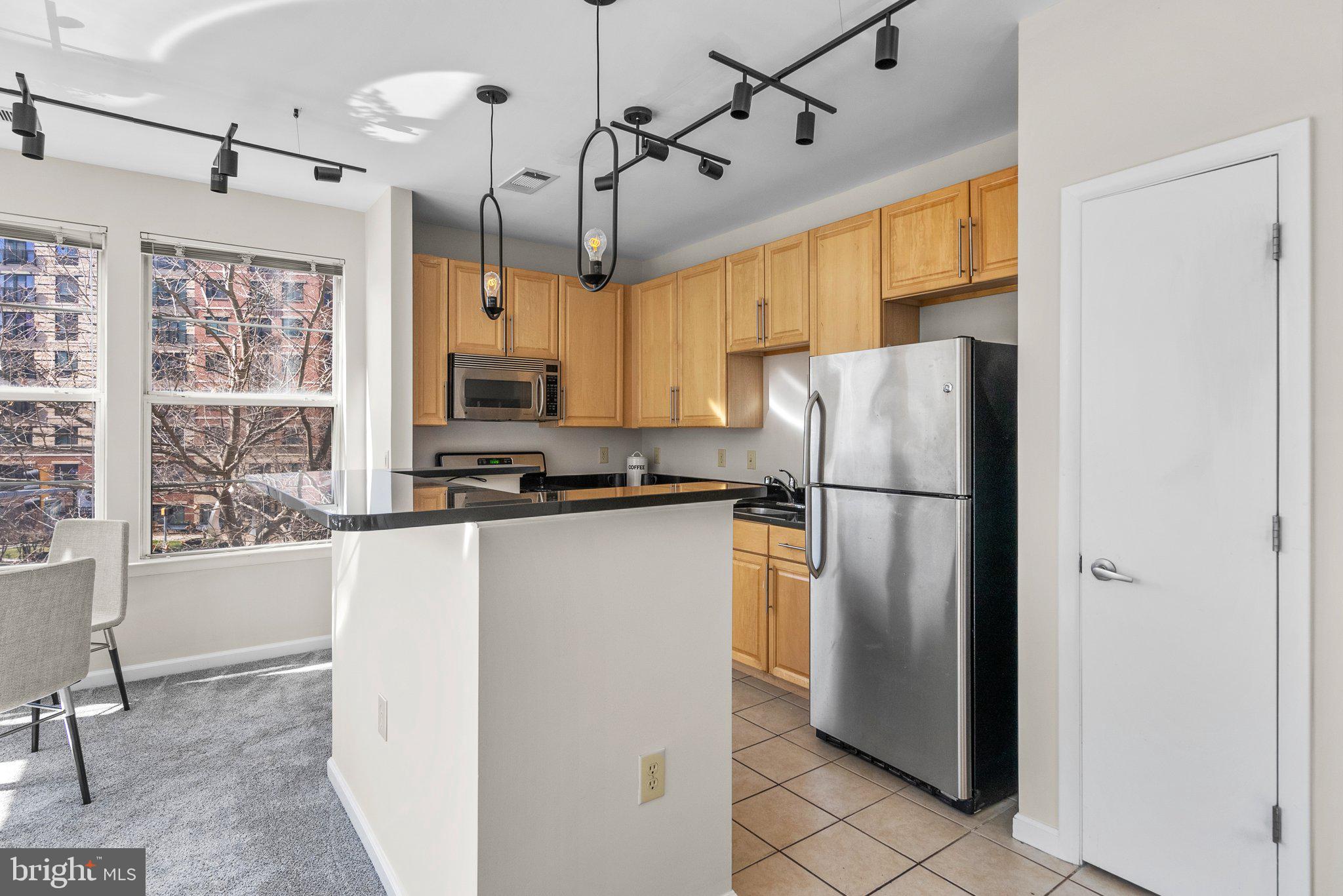 1201 EAST WEST HIGHWAY 211