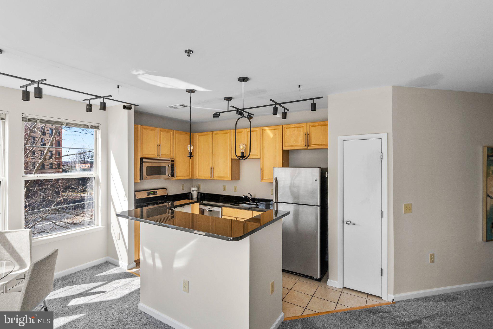 1201 EAST WEST HIGHWAY 211