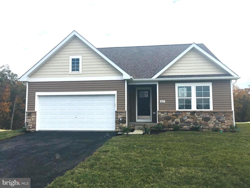 Ready for move-in! Gorgeous Rancher with covered porch situated directly in front of a tree preserve.  Enjoy nature and very little yardwork with this lovely home with upgraded maple Willow cabinets, granite countertops, stainless appliances, engineered hardwoods in the foyer, hallways, kitchen and family room.  Owner's suite with tray ceiling and generous walk-in closet, owner's bath with stand up shower and seat.  Bedrooms 2 and 3 are separated/split from the owner's suite for added privacy.  Full unfinished basement with 3 piece rough in and partial walkup for future expansion or storage.