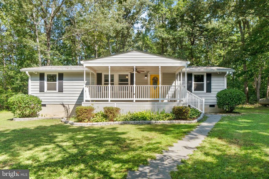 This adorable one level home is seated on just over 6 acres of land in a fantastic location! Just minutes from Route 3, Central Park, and I95. Far enough away to enjoy the quiet with a cup of coffee on the extra large front porch!