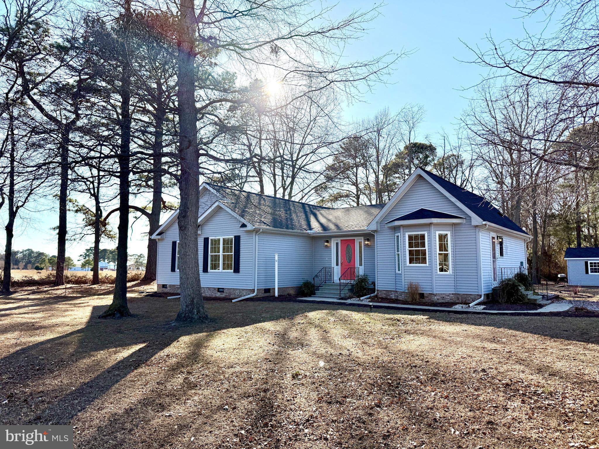 Discover this beautifully maintained contemporary ranch home that has 3 bedrooms and 2.5 baths that is in a desirable waterside neighborhood featuring a community pier on the Nanticoke River. The home features a nice sized kitchen with plenty of cabinetry, ample counter space, and a cozy breakfast nook. The spacious master suite is a true retreat, featuring a walk-in closet, a garden tub, and a separate shower. The home features a recent roof (2023), a new water heater and water system, ensuring reliability and comfort for years to come. The exterior is just as impressive with a newer 14x28 shed/garage (2023), offering ample space for storage, a workshop, or your outdoor gear. Enjoy breathtaking sunsets from the deck or take advantage of the community pier where you can fish, crab, swim, have a picnic, and enjoy stunning water views. This home is also close to several marinas and parks, including Roaring Point Beach, which is just a stones throw away. This home is move-in ready and offers a peaceful setting with beautiful surroundings. Now is the perfect time to make it yours!