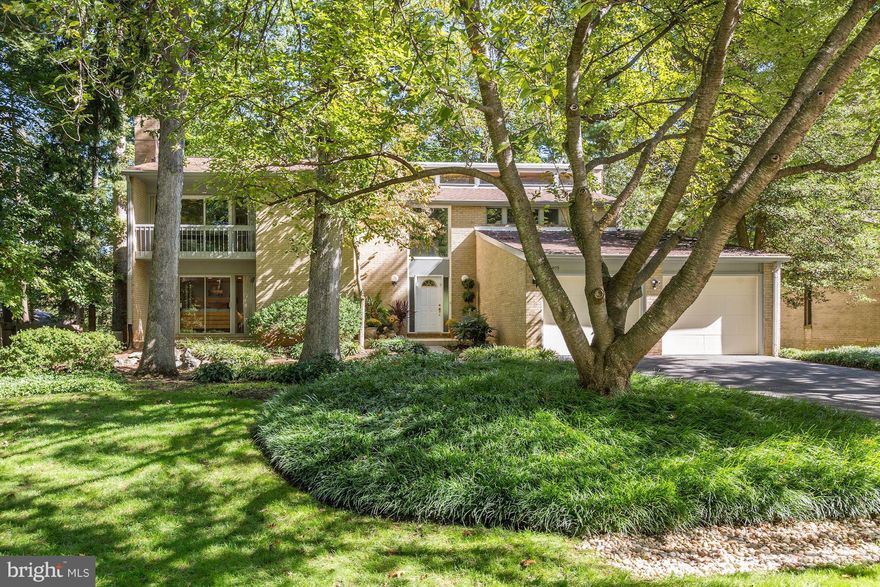 Sun-drenched 5BR opt 6thBR/4.5BA Contemporary in a CLOSE-IN LOCATION w/ fantastic OUTDOOR SPACE + gorgeous views. HUGE MULTI-LEVEL DECK, LARGE RENOVATED GOURMET KITCHEN w/ WOLF COOKTOP,DACOR DOUBLE OVENS & WARMING DRAWER & GRANITE COUNTERS. STUNNING bfast rm surrounded by windows. Vaulted ceilings,newly refinished hrdwds. Family Rm open to Kit. Huge walkout LL w/ Rec Room.