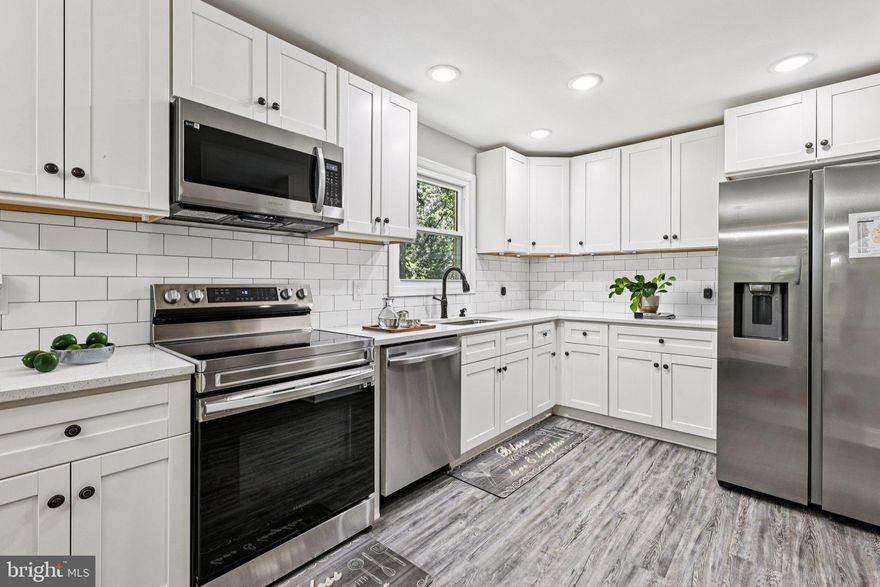 A  La Plata beauty that is truly move in ready!!!   Featuring 3 bedrooms and 3 full baths, the home sits on a quiet corner lot of over an acre with no HOA.  Parking is easy with an expanded driveway and covered carport. This all-brick rambler offers timeless style blended with modern updates across two spacious levels.

Inside, enjoy a freshly updated interior with new flooring and paint that create a bright, welcoming feel. The main level includes a cozy living room with fireplace, a gourmet kitchen with new stainless-steel appliances, and a massive owner’s suite complete with private bath and walk-in closet. A sun-filled secondary bedroom and an additional full bath complete this level.

The fully finished basement is a standout, with its own private entrance and incredible versatility. Perfect as an in-law suite, guest apartment, or income-producing rental, it includes a second living room with fireplace, a full bedroom, full bath, laundry, and extra storage.

Outside, the wraparound yard offers endless possibilities for gardening, play, or entertaining. Meticulously updated and thoughtfully designed, this home provides comfort, flexibility, and space rarely found in one package. Schedule your private tour today!