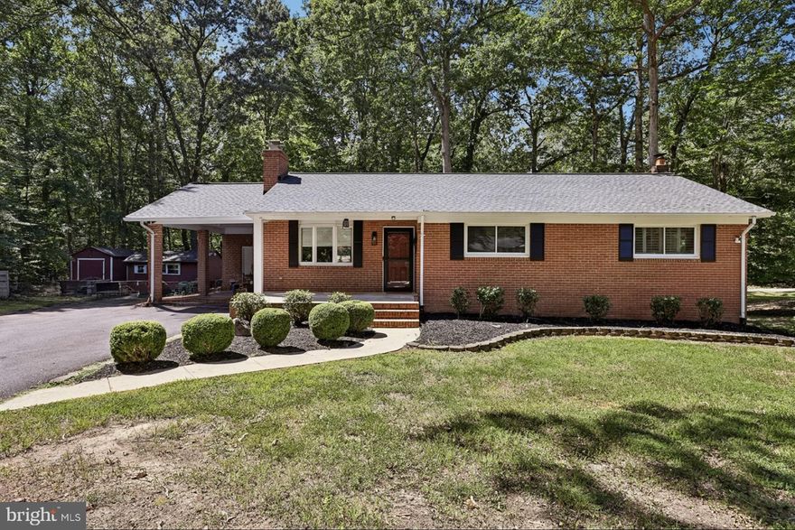 MOTIVATED SELLER!!! GET YOUR BUYERS A HOME FOR THE HOLIDAYS!!!  This all-brick rambler offers timeless style blended with modern updates across two spacious levels. Featuring 3 bedrooms and 3 full baths, the home sits on a quiet corner lot of over an acre with no HOA. Parking is easy with an expanded driveway and covered carport.

Inside, enjoy a freshly updated interior with new flooring and paint that create a bright, welcoming feel. The main level includes a cozy living room with fireplace, a gourmet kitchen with new stainless-steel appliances, and a massive owner’s suite complete with private bath and walk-in closet. A sun-filled secondary bedroom and an additional full bath complete this level.

The fully finished basement is a standout, with its own private entrance and incredible versatility. Perfect as an in-law suite, guest apartment, or income-producing rental, it includes a second living room with fireplace, a full bedroom, full bath, laundry, and extra storage.

Outside, the wraparound yard offers endless possibilities for gardening, play, or entertaining. Meticulously updated and thoughtfully designed, this home provides comfort, flexibility, and space rarely found in one package. Schedule your private tour today!