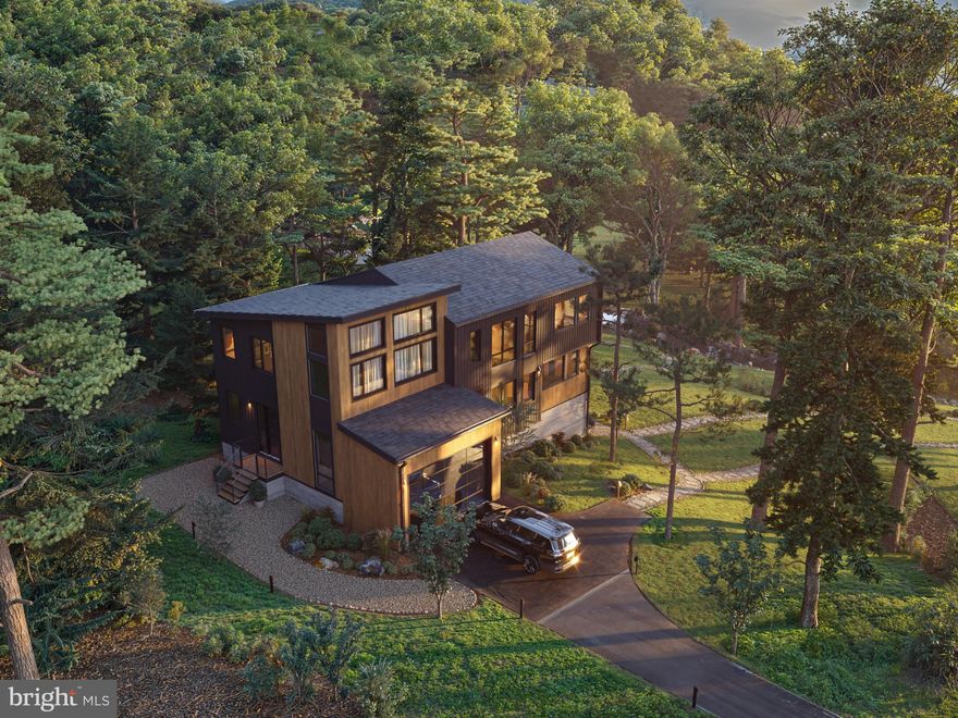 Tucked deep into a serene, wooded parcel in the heart of Wyncote, 1039 Greenwood is poised to become a one-of-a-kind architectural statement—inspired by the Pacific Northwest. Designed and built by Design Pro Development—renowned for delivering over 500 homes throughout Philadelphia and Montgomery County, this immaculate to-be-built home blends luxurious detailing with practical functionality. Inside, the home’s open-concept layout is punctuated by natural textures and rich materiality. Soaring 9-foot ceilings are accentuated by exposed wood beams, while oversized windows bring the outdoors in—framing lush greenery and flooding the interiors with light. The living area flows seamlessly into a designer kitchen, where custom wood cabinetry, waterfall-edge quartz countertops, and intricate lighting fixtures create a striking yet functional space for everyday living and elegant entertaining. A large open living room is the ideal space for large family gatherings.  The primary suite serves as a sanctuary, with soft wood accents, refined textures, and a dramatic, spa-like bath featuring a dual vanity, deep soaking tub, and vertical accent wall—designed with equal parts comfort and visual serenity in mind. Additional features include 2x6 exterior frame construction, energy-efficient mechanicals, as well as desirable builder options such as a gas burning fireplace, fully finished basement, expanded outdoor patio area and more. A permeable gravel driveway and thoughtfully curated exterior finishes echo the home’s environmental sensitivity and understated sophistication, reflecting a Pacific Northwest lifestyle. Located conveniently close to some of Wyncote’s most popular favorites like Elcy’s Café, Human Robot Brewery, and Whole Foods Market as well as nearby cultural gems including the Keswick Theatre and Curtis Arboretum. With regional rail service just minutes away, Wyncote offers a perfect blend of convenience, character, and community. Don't wait to schedule an on-site tour with our development team!