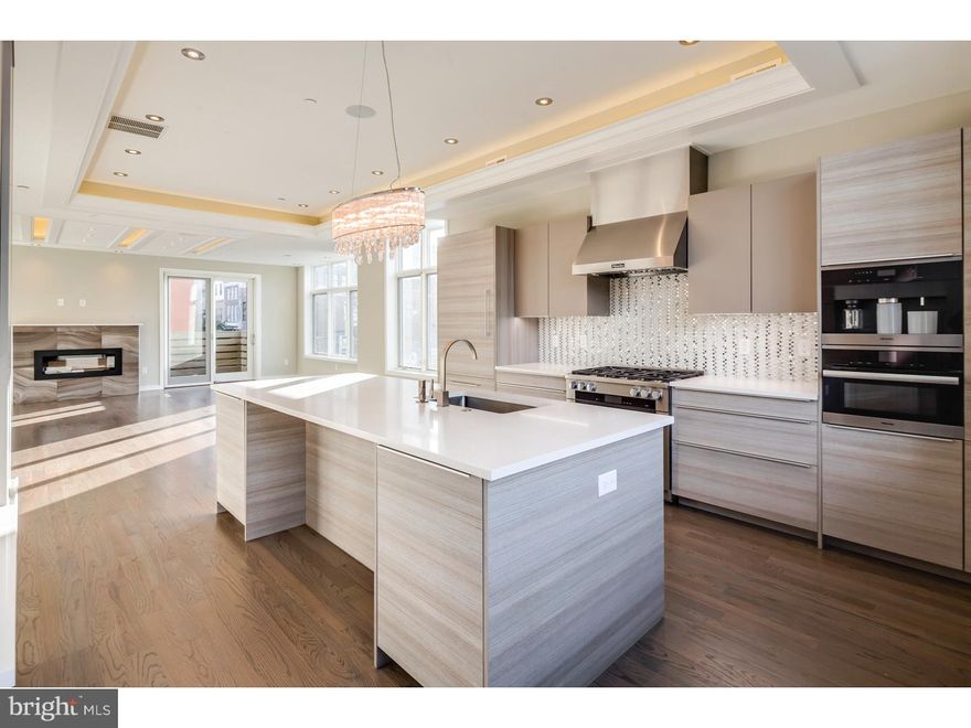 Spectacular new homes with every amenity imaginable! Riverside Luxury Townhomes have 5,500+ square feet of living space built by a meticulous custom home builder. Features include 2-car garages, approved tax abatement's ($1044 /2016 annual taxes), theater rooms, a 6-stop elevator, 3 zoned HVAC systems, smart home technology systems and 4 outdoor spaces including an amazing roof deck. Each home has 4 to 5 bedroom layouts plus bonus rooms, five full bathrooms, and one half bathroom. The master bedroom suites occupy an entire floor of each home and are to die for!  The master baths are enormous with designer oval soaking tubs, open tiled European shower rooms, perfect tile choices and dual vanities crafted by Porcelanosa. The master bedroom levels also have two walk in closets with custom shelving and large sun-drenched sleeping areas with over-sized windows. The kitchen is a true masterpiece with Poggen Pohl cabinetry, Silestone counters, top of the line Miele appliances and a huge island for entertaining and dining. These homes are an example of expert old world craftsmanship that is difficult to replicate, with accent lighted crown moldings in the kitchens and coffered ceilings in the living areas. The living rooms also have gas fireplaces, several floor to ceiling windows, elegant hardwood floors and designer wood staircases with iron and glass railing system right out of Architectural Digest magazine. Too much to mention in one short summary!! The lower levels are accentuated by theater rooms, a full bathroom and home gym. The smart home system includes a security alarm, video intercom system and a home automation system. Each bedroom is spacious and has large closets and tons of natural light. Every bathroom is unique with designer fixtures and perfect tilework. The craftsmanship in these homes is stunning. The roof decks are over 60 feet high and have unobstructed views of the Delaware River and Ben Franklin Bridge to the East and of the city's amazing skyline to the West. These enormous roof decks are properly supported to hold a full size hot tub, and are equipped with gas lines, electric and running water. Riverside Luxury Townhomes are located in Philadelphia's most historic neighborhood. Walk the cobblestone streets to some of the city's best restaurants and boutiques. The homes are bordered by a park and have easy access to major thoroughfares. This unit is a corner with side by side 2-car garage!