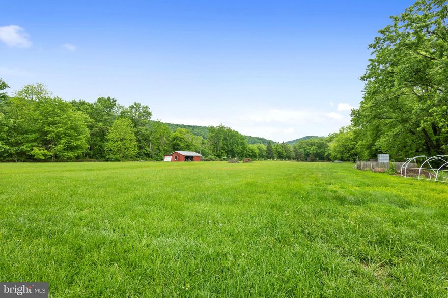 3015 Cumberland Road, Romney, WV – 4.5 Acres with Pond, No HOA. Located approximately one hour from Winchester, this 4-bedroom, 2-bath brick rancher sits on 4.5 acres of flat land. The property features a private pond and outbuildings. The home has a functional layout and has been maintained, but does need some updates/repairs. It is being sold as-is. Buyer will be responsible for obtaining flood insurance. For more information or to schedule a showing, contact the listing agent.