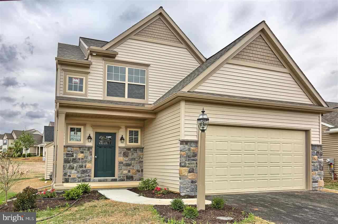 EG Stoltzfus Jameson model, optional elevation A with full porch,etc. 2' added to garage, 4' added to D Room, Laundry converted to Mud room/Laundry, plus all other extensive standard EGStoltzfus standard features. Photo is on similar home.