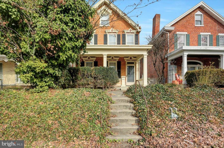 Own a piece of history in Chambersburg! This beautiful, well-maintained colonial all brick house sits high off of Queen St. and offers a large partially fenced, detached garage with back alley. Its 1920's charm is still seen  throughout the house. From custom built ins, crown molding, large windows, a beautiful banister and an amazing 3rd floor this house offers so much! This house also comes with several updates such as flooring, replacement windows,  new central A/C and second story porch.  Enjoy everything that downtown has to offer while comfortably living in this historic, detached house.