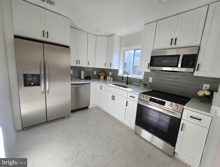 Back on the market!!!  The buyer failed to fulfill their obligations and did not perform.
Here is a beautiful and recently renovated two-bedroom, one-bathroom condominium located in the desirable Pinewood Lawns neighborhood in Alexandria. It features a modern and stylish kitchen equipped with everything you need to prepare your favorite meals. Some features you will appreciate in this kitchen are tall, brand-new soft-closing cabinets, brand-new stainless-steel appliances, lovely quartz countertops, and an attractive backsplash. The condominium has been freshly painted and boasts recessed lighting and a modern chandelier in the dining area. The closets are equipped with sensor lights, and the spacious main room includes a walk-in closet with a barn door. A sliding glass door leads to a charming patio area. The bathroom has been tastefully updated. The AC unit and water heater have both been recently replaced.  Windows were replaced earlier this year.  One covered parking space #281, owners have the possibility to get an additional parking tag.  Don't miss this opportunity to make this wonderful property your home!