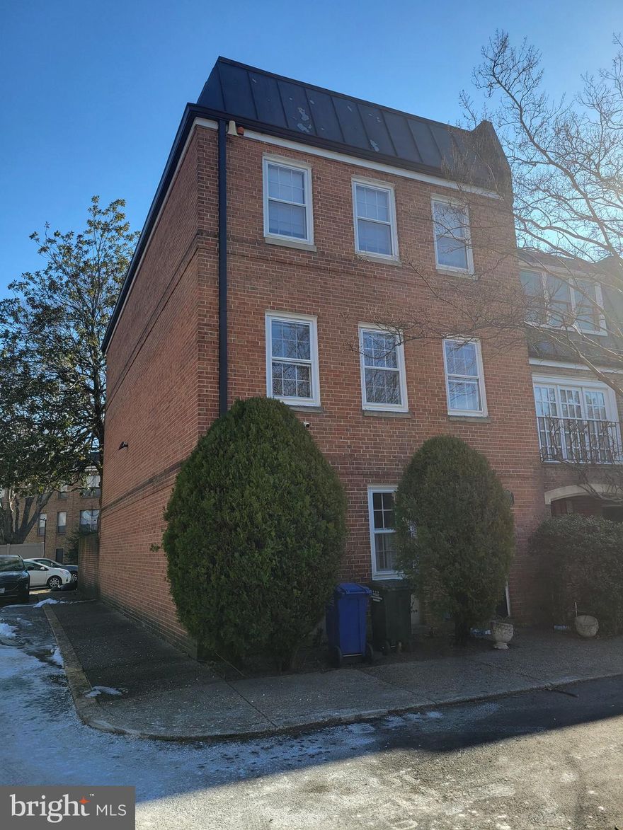 Experience urban sophistication in this exquisite 4-bedroom, 3.5-bathroom row home nestled in the sought-after Southwest neighborhood. The main level showcases a bright and spacious family/living room with a bar and stool bars, looking onto a back patio next to a large laundry room with plenty of cupboards. There is also a half bath, and a bonus room with large closets, perfect for a study or home gym. Upstairs, you will find a full eat-in kitchen with stainless steel appliances. The hallway leads to a large living room and, on the other side, the dining room. Next floor offers, the master bedroom with en-suite newly renovated full bath with marble tiles, and two additional bedrooms with closets. New wall-to-wall carpeting throughout, adding to the home's coziness and appeal. Outside, the private backyard terrace provides ample entertainment space. Two parking spots available in front of the house. Located near Nats Stadium, metro stations, shops, restaurants, and more, with easy access to 395, this home offers unparalleled convenience and lifestyle.