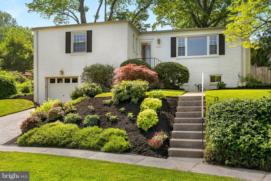 Welcome to this lovely raised ranch home with screened-in porch & patio, as well as an over-sized garage, perched on a large and beautifully landscaped & fenced lot in a quiet cul-de-sac! Gleaming hardwood floors adorn the main level, with an attractive wood burning fireplace with wood mantle, marble surround & stone hearth! You'll love the new dishwasher, as well as other updated appliances and kitchen cabinets! The bedrooms have ceiling fans and bathrooms have been updated, including marble tile in the master bath. The gorgeous, fully finished lower level is fantastic for entertaining, with full, kitchenette/granite topped wet bar & back-splash and wine & mini fridges, as well with ceramic tile floor, built-in bookshelves, recessed lighting, half bath, laundry room & lots of storage!