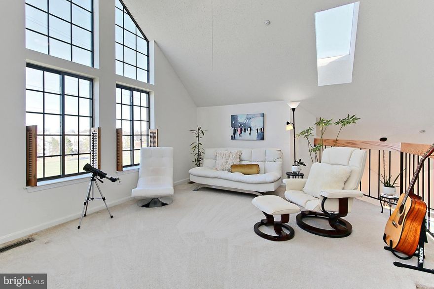 Live the perfect blend of modern-style, loft-living,  walkability and convenience in this stunning 2BED/2BATH/2-LEVEL Penthouse/Corner-Unit Loft Condo w/finished 10’x20’ private garage AND an upper-level BONUS ROOM/DEN/STORAGE AREA, in the vibrant Kingstowne area of Alexandria, VA. 

Offering 1,229sg.ft. of thoughtfully designed living space, this home has been meticulously updated to ensure comfort, peace of mind and light…LOTS of light! In addition to a soaring 20’ ceiling, enjoy recent enhancements such as a full HVAC replacement in 2023 (inside + outside units), along with the new IN-UNIT washer/dryer and microwave. The building boasts a new roof from 2022, plus all-new in-unit plumbing was installed in 2021, complemented by updated LR/DR flooring.

Inside, a spiral staircase ascends to a charming loft with a woodburning fireplace for cozy cool nights, skylights, and expansive all-the-way-to-the-ceiling windows that bathe the space in natural light - prepare to be inspired!

The well-appointed kitchen, bedrooms and two updated bathrooms contribute to the home's inviting atmosphere. Residents benefit from access to Manchester Lakes amenities, including a fitness center, swimming pool, tennis and basketball courts, and more.

Ideally situated near Kingstowne's vibrant restaurants, cinema, and shops, with easy access to the Metro and Springfield Town Center, this home is perfect for those who are always on the go, but who also want a home retreat worthy of their busy lifestyle. Scheduled exterior stair replacement in Spring/Summer 2025 add further value. With water and trash included in the condo fee, this property offers a seamless living experience. And all this for under $500k?? DON’T MISS THIS EXCEPTIONAL OPPORTUNITY!