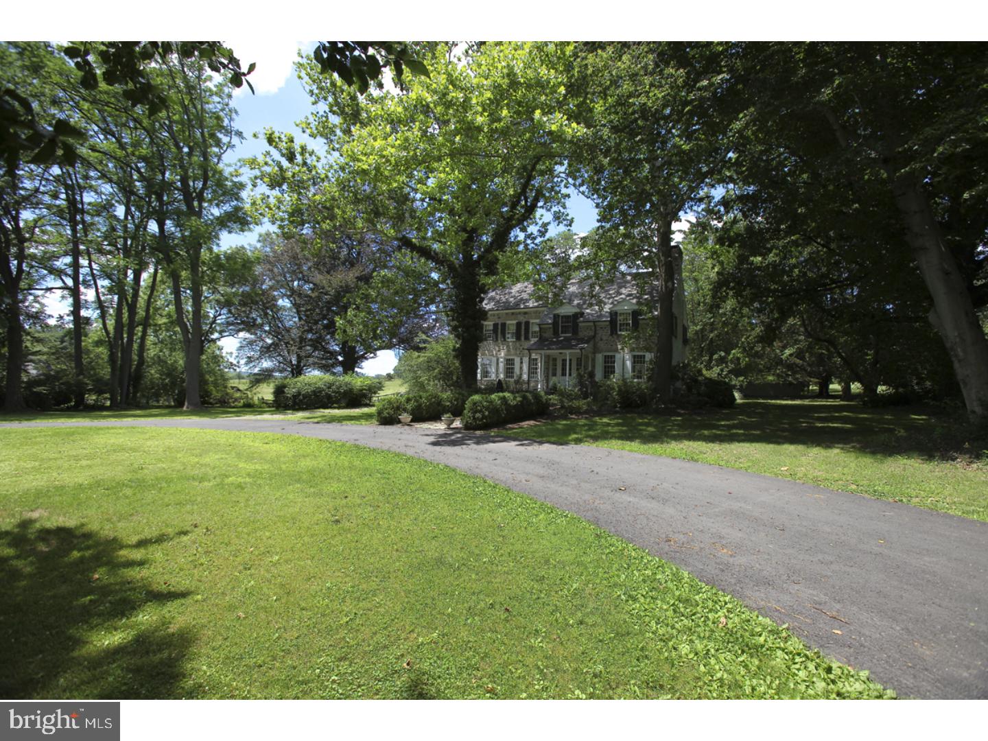 This exceptional property is one of Bucks County's premier estates and was part of the original William Penn land grant. Its more than 190 acres is the backdrop for an extraordinary compound of three homes, barns & stables, historic outbuildings, picturesque ponds and rolling pastures and countryside. Part of Fashion Farms, a renowned group of horse breeding farms, it has panoramic views of mountains and is an idyllic and beautiful retreat. The tree-lined driveway leads to a stone Grand Manor House, circa 1713, that is the epitome of refined elegance and gracious, comfortable living. More than a stunning home, it promotes a lifestyle that could take many directions, both formal and casual, to satisfy the most discerning buyer. In addition to the manor house with its period ambiance and custom detailing, there is a Victorian guest home, an authentic 1740 cottage and a bank barn complete with stalls, hay storage and caretaker's apartment. Amenities include lighted tennis courts, swimming pool/spa with pool house, spring house, garages, greenhouses, paved roadways and updated mechanicals. Currently a turnkey breeding operation, the property has the amenities and acreage to be a premier equestrian or agricultural business, or simply a distinguished country estate.