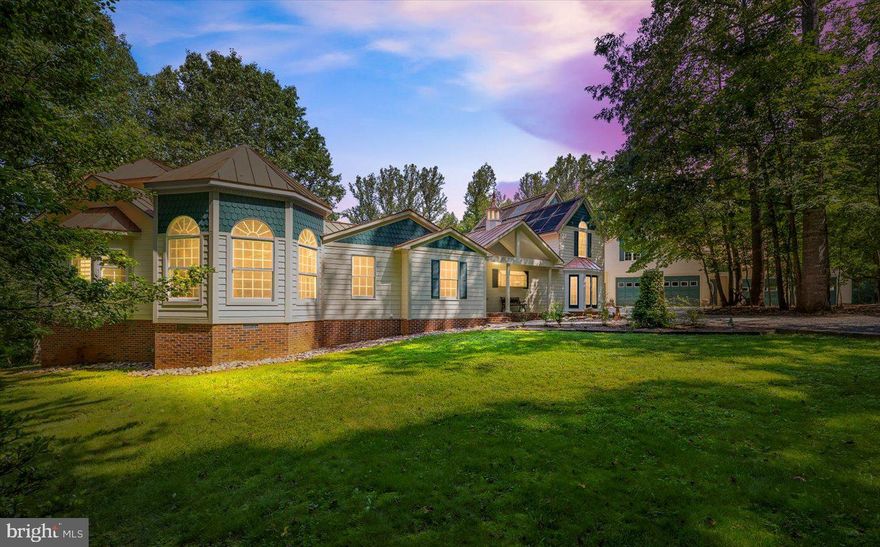 6360 Tennis Court | Culpeper, VA - A Grand Custom Estate Designed for Luxury Living, Multi-Generational Comfort & Unforgettable Entertaining! Welcome to this exceptional, custom-built estate offering more than 9,000 square feet of versatile, light-filled living space. This home has been expertly crafted to blend comfort, style, luxury, and effortless entertaining into one seamless living experience. Tucked on a picturesque 3.39-acre lot just 15 minutes from downtown Culpeper, this one-of-a-kind residence boasts six bedrooms, 7.5 baths, including two potential in-law suite spaces, and an enviable array of indoor and outdoor amenities. Custom built with impressive additions over the years, the home sits gracefully among mature trees and scenic landscaping. A tranquil, fish-stocked pond anchors the backyard, while the rear exterior unfolds into an expansive private oasis complete with a fenced-in infinity-edge pool, vast patio and deck areas, and breathtaking natural views. Whether hosting croquet matches on the lawn, lounging beneath the gazebo, or relaxing in the marble-clad outdoor sitting area, this property is designed for effortless enjoyment. Interior Highlights -  Once inside discover soaring ceilings, abundant natural light, and a series of architecturally intriguing spaces. The two-story family room stuns with a dramatic wall of windows, 16-foot custom bookshelf, floor-to-ceiling stone fireplace, and lofted flex space ideal for a home office or library. The gourmet kitchen features marble flooring, a custom Wolf range, and stylish finishes that flow seamlessly into the dining and living areas. Just off the family room, a sunroom with Murano glass chandelier and kitchenette offers panoramic views of the backyard paradise. The primary suite is a masterpiece of privacy and design, boasting 10-foot geometric mahogany doors, a granite feature wall with ambient uplighting, and an ensuite bath with a rain shower, soaking tub, and oversized picture window framing the surrounding woods. A private red spiral staircase leads to a lofted bedroom retreat, while the closet is fully built-out for organization and luxury. Multi-Generational Flexibility -  This estate is uniquely equipped with two separate suites, each with its own private entrance and full accommodations.  The first suite features a marble kitchen, sunroom, two bedrooms (including a luxe primary with tray ceilings), private deck, and lower-level access to a workshop, exercise room, and more. The second suite offers open-concept living, dining, and kitchen areas, a cozy corner fireplace, and stunning veranda views of the pool and pond. Its spacious bedroom enjoys private outdoor access and nearby storage. Additional Property Features -  Fenced infinity-edge pool with new cover, 8x12 storage shed, pole barn with two-car capacity, marble-draped exterior lounge areas, unique architectural elements including lava floors and custom lighting installations, movie room, craft/laundry room, and flexible recreational spaces.  Just 30 minutes to Shenandoah National Park and approximately one hour to Fredericksburg, Charlottesville, and Washington, D.C. Certainly! Whether you're drawn to the resort-style amenities, custom architecture, or the exceptional indoor-outdoor lifestyle, 6360 Tennis Court offers a rare blend of grandeur, comfort, and unforgettable charm!