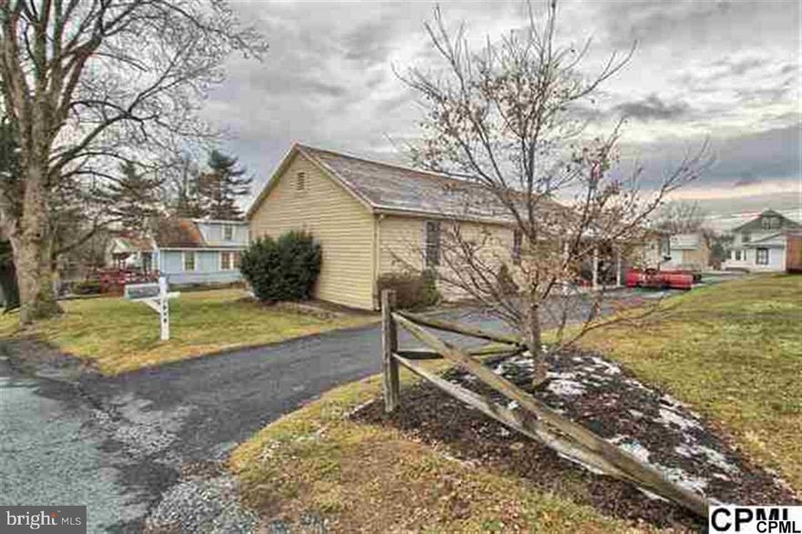 Totally remodeled (down to studs) 3 BR, 2 Bath, detached ranch home w/tiled baths & laundry, new windows, countertops, appliances, electric service, plumbing and priced to sell!  Hardwood floors in kitchen, living and dining rooms, enclosed porch.  Spacious, level yard, 26 x 15 garage style shed, off street parking, convenient location and plenty of attic storage. A joy to show!