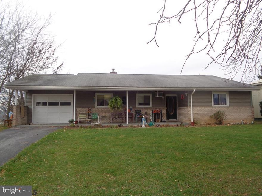 See the potential in this 2 bdrm, 1.5 bath fixer situated on the edge of Shawnee Hills.  Home features hardwood floors, gas fireplace and level lot with great views.  Heated 2 car detached garage makes nice workshop or storage.