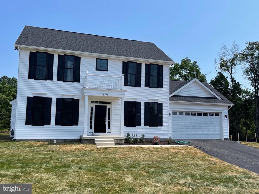 Immediate delivery New Construction. This beautiful Remington Model is move in ready. It has a ton of upgrades. White siding with black framed windows that pop! Granite counters and white cabinets, kitchen island,  gas fireplace, huge windows for tons of light, stainless steal appliances, luxury vinyl plank flooring throughout all three levels. Beautiful tile in all three full bathrooms.  Fans in all four bedrooms, recessed lights everywhere, high ceilings, covered back patio with a fan. Two car garage, finished basement with full size windows and sliding glass door the walk up stairs. Almost a quarter acre lot backing to woods, on a cul de sac! Close to Main St in Old Town Warrenton, shopping, commuting, and entertainment!