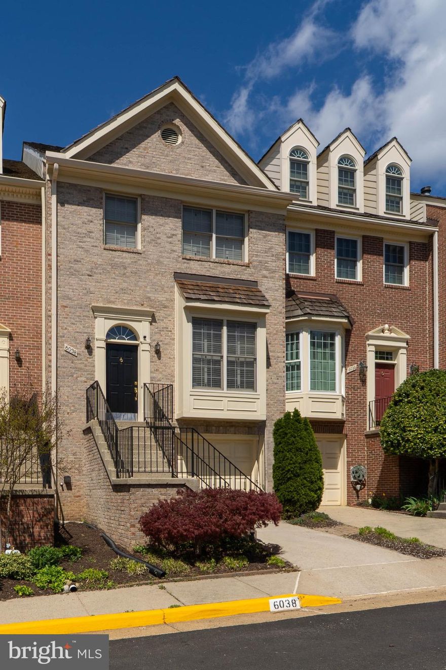 A remarkable home in such a convenient location—this one is sure to go quickly! Just a short distance from Seven Corners and its unique culture and dining options. The elegant entrance opens into a spacious living and dining area. Custom millwork and tasteful architectural details enhance the home’s elegance, complemented by hardwood floors found throughout. The main floor powder room is located just off the living room and past the dining area, leading into the gourmet eat-in kitchen. Gorgeous countertops, upgraded stainless steel appliances, a pantry, and abundant cabinet space will delight any cook. The breakfast area overlooks the beautifully landscaped backyard. Mornings and late afternoons are best spent on the deck—an ideal spot to start your day or relax in the evening.

Upstairs, you’ll find three bedrooms, including the master suite, and two full baths. The master suite is truly a retreat, featuring soaring cathedral ceilings, skylights, a separate sitting area, and a luxurious bath. Glass French doors lead to a spacious bathroom with plenty of room to get ready in comfort. After a long day, the jetted garden tub is the perfect place to unwind. With such comfort, it’ll be hard to leave for work in the morning.

The basement offers access to the one-car garage and features a cozy family room with a fireplace—perfect for keeping warm in the winter months. An additional full bath in the basement adds convenience, especially for guests. There’s also a roomy laundry area with ample space for sorting and folding.

This home is well-priced and definitely checks all the boxes. It’s close to major transportation routes, the Falls Church and Ballston Metro stations, and several bus lines. Reagan National Airport is just minutes away. You’re also a short distance from downtown Falls Church, with abundant dining and entertainment options nearby.