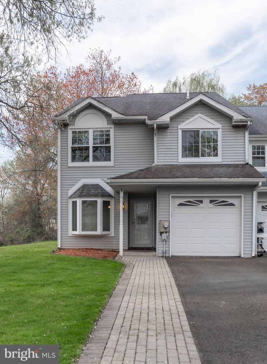 Welcome to this 3-bedroom, 2.5-bath townhome nestled in a charming and peaceful cul-de-sac in desirable Saw Mill Valley, right in the heart of Horsham with no HOA fees, a rare and valuable bonus!  Step inside to a welcoming foyer that flows seamlessly into a bright kitchen featuring a cozy breakfast nook perfect for morning coffee or casual dining. The main level also offers a dining room, a spacious living room highlighted by a stone wood-burning fireplace and sliding glass doors that lead to the backyard, a conveniently located powder room with a new vanity and hardwired smoke detectors throughout the home for peace of mind.   Upstairs, the primary suite impresses with vaulted ceilings, ample closet space, and a private bath featuring a shower stall, double sinks and a linen closet. Two additional generously sized bedrooms offer plenty of closet space, a hallway bath and a second-floor laundry provides everyday convenience. Enjoy outdoor living in the large backyard that backs up to open space, complete with a paver patio ideal for relaxing or entertaining. Located in a quiet, sought-after community close to shopping, dining, and major routes, this home combines comfort, functionality, and a prime location. Don’t miss the opportunity to make it yours!