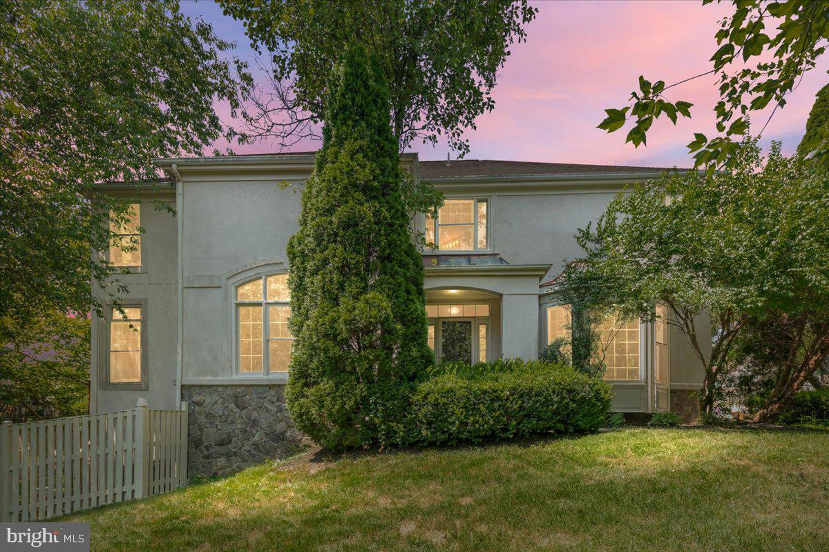 PRICE REDUCTION! You do not want to miss this beautifully maintained 5-bedroom, 4.5-bathroom colonial in the highly desirable Edgemoore neighborhood. Ideally located less than 1.5 miles from the Vienna Metro and offering easy access to I-66, Oakton High School, local shops, and downtown Vienna, this home combines timeless charm, generous living spaces, and unbeatable convenience.
Freshly painted inside and out, this classic colonial offers a spacious and elegant layout that’s ready for your personal touch. Step inside to an inviting open-concept layout complemented by classic living spaces, including a formal dining room, welcoming living room, and a cozy den/library with built-ins. Hardwoods flow throughout the main level. Designed for both everyday living and entertaining, the kitchen features abundant cabinetry, a gas cooktop (2020), double ovens, a newer refrigerator, and a one-year-old dishwasher with recessed lighting.
Off the kitchen, the dramatic two-story family room is filled with natural light from oversized windows and sliding doors, and includes a built-in entertainment center and plush carpeting for added comfort. Step outside to the freshly painted deck—complete with a built-in retractable awning—overlooking a flat, landscaped backyard that backs to serene common space.
Upstairs, the expansive primary suite features two walk-in closets and a spacious en-suite bath with dual vanities, soaking tub, and walk-in shower with bench seating. Bedroom two offers a walk in closet and en-suite full bathroom with tub shower. Two additional bedrooms offer ample closet space, and completing the upper level is an additional full bath.
The finished walkout basement provides versatile living options with large tile flooring, a spacious rec room, full wet bar, fifth bedroom, and full bath—ideal for guests or extended family. Sliding doors lead to a brick patio and a fully fenced backyard for outdoor enjoyment.
With solid bones, fresh paint, and a flexible layout, this home is full of potential and perfectly positioned for its next owner to come in and make it their own. A rare opportunity in one of Vienna’s most convenient and charming neighborhoods.