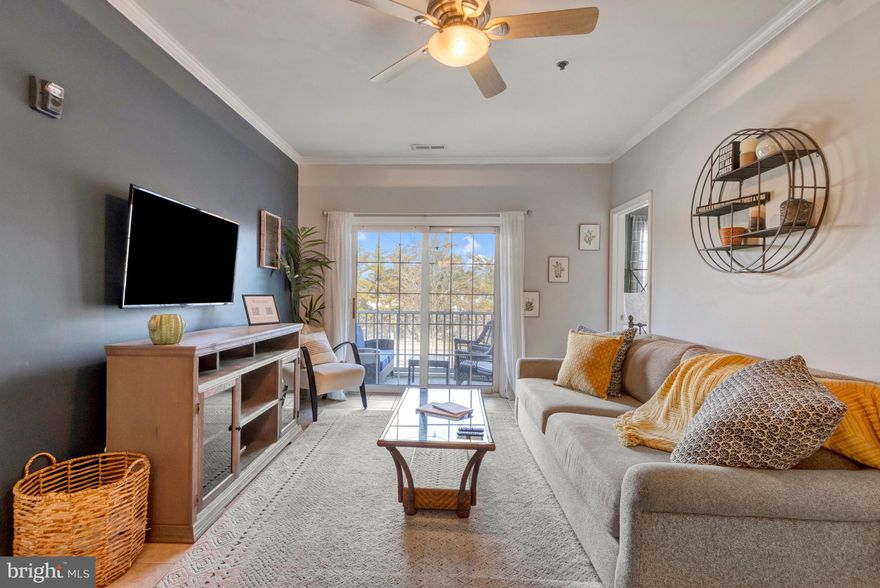 Turn-Key Rehoboth Beach Condo | Proven Airbnb “Guest Favorite” | Close to Bike Trail

Fully furnished and turnkey, this spacious 2-bedroom, 2-bath condo offers the perfect opportunity to own a personal beach retreat that can generate income when you're not using it. Located in a secure gated community just minutes from Rehoboth Beach, this second-floor residence is one of the few condo communities in the area where short-term rentals are permitted, and it has already proven its success as a highly rated vacation rental.

Inside, the condo features a relaxed coastal-inspired design with warm wood tones, natural textures, and stylish boho accents that create an inviting beach retreat atmosphere. Large windows and sliding glass doors fill the space with natural light, while the screened porch extends the living area outdoors, offering a peaceful place to enjoy coastal breezes after a day at the beach.

The open living area provides a welcoming space to relax or entertain, with sliding glass doors leading directly to the private screened-in patio. The adjacent kitchen is well-appointed with granite countertops, stainless steel appliances, ample cabinetry, and generous prep space, making it easy to cook at home or host guests.

The thoughtfully designed layout includes two spacious bedrooms and two full bathrooms, offering privacy and flexibility for family and visitors. The primary suite features its own private bath, while the second bedroom enjoys direct access to the hall bathroom, creating a convenient semi-private suite arrangement ideal for guests.

The property has been an exceptionally successful short-term rental for the past four years, earning “Guest Favorite” status on Airbnb and a perfect 10/10 rating on Booking.com, making it an attractive opportunity for buyers seeking both lifestyle and income potential.

The location offers exceptional convenience to the best of coastal Delaware. Enjoy restaurants and shops within walking distance, less than one mile to the Junction & Breakwater Trail for scenic bike rides between Rehoboth Beach and historic Lewes, just 4 miles to downtown Rehoboth Beach, and approximately 3.9 miles to downtown Lewes.

Whether you're seeking a low-maintenance coastal getaway, a lock-and-leave second home, or a property with proven rental income potential, this turnkey condo offers comfort, convenience, and exceptional value near Delaware’s most beloved beach towns.