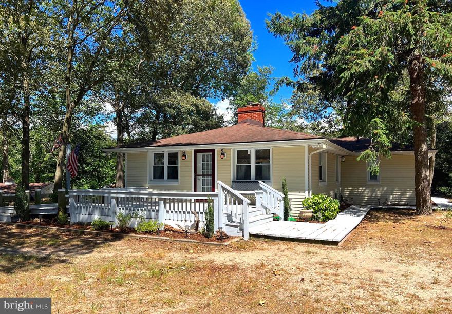 Perfect waterfront retreat for hunters and nature lovers! Views of the 485’ water frontage from living room as well as creek views from kitchen. Enjoy everything the Shore has to offer with this home. Fully renovated and remodeled one level cottage  offering gorgeous water and sunset views. Great waterfowl hunting and fishing potential in front and back of property. Property also offers 100 foot dock with slips and 2+ MLW. Upgrades and features include: Original hardwood and tile floors, new heat pump with gas backup, primary bath with tiled shower, kitchen with stunning counters and new cabinets. Serene neighborhood minutes from Easton or Denton. Enjoy privacy, nature, and convenience with this adorable home!