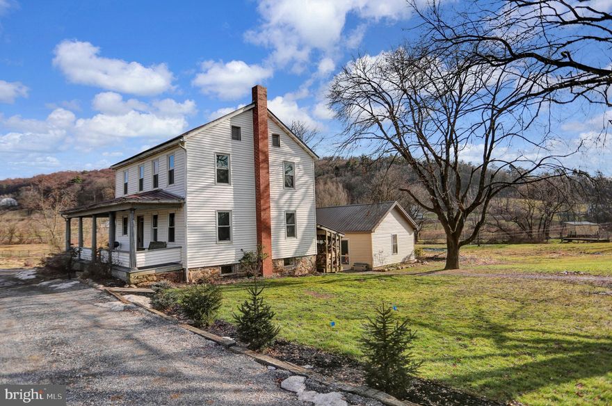 'Motivated SELLERS' offer NEW Price of $239,900! Check it Out!  Where else can you buy this opportunity for under $250,000?  Visible-Accessible - Location Supreme for this dual road frontage 15.7 acres Farmette.  Five bedroom Farmhouse and banked barn with horse stalls.  April 29th New Bio-Organic Eco Septic drain field system finished along w/ new 1000 gal concrete septic tank put on the Farmette.  Cocolamus Creek meanders through the fenced meadows. {4 inch squares topped with barbed wire, to pen flocks of choice.}  Most windows replaced throughout the home. Golden oak stained kitchen cabinets, double sink. No central heat. Ashland Lump Coal/ wood stove in recent concreted basement, Two full bath but handicap shower on first floor needs hooked up. 54' x 52' banked barn and potential garage/implement shed attached. Upgraded horse stalls, w/ comfort underfoot. 2019 built commercial wash/baking shop/ has potential, heated tile floor heat and it's own 1000 gallon holding tank for grey water/possible 'shop/store/Air BnB of choice'. No electric hooked up in home. Breaker box in basement and most ceiling and wall outlets left in. NEW WELL drilled in Jan. 2024. Bring your FAV animals of choice, of course!  Cash or conventional only, from local PA Bank Portfolio for buyer loan approval. Taxes are $1,652/year. Great visibility for entrepreneur! Bring a Vision into REALITY, in central Juniata County.