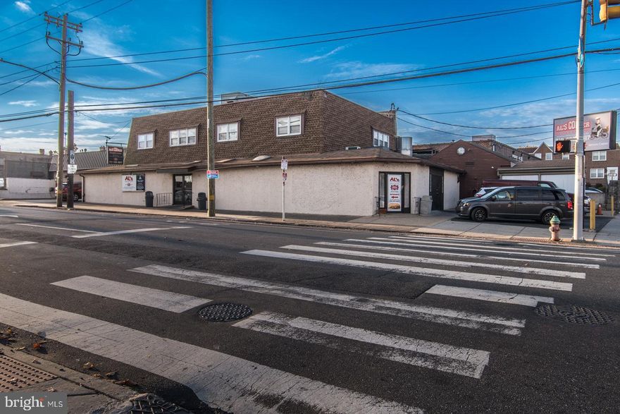 Seize this incredible opportunity to purchase this huge, highly visible, corner,  commercial mixed use property.  The 8,412 sqft property features CMX1 zoning with 6132 sqft of 1st floor commercial/retail space and 2280 sqft of 2nd floor apartment space.  There are currently (2) huge two bedroom apartments with all separate utilities and central air throughout the entire building.  There are  7 off street parking spots. and lots of street parking. The commercial space has been occupied by a family owned Deli that has operated for the last 48 years from this location.  The property is located at the busy corner of Rhawn and Torresdale in the densely populated Mayfair area.  The Sale is for real estate only all equipment is owned by the tenant. This is a great investment opportunity for an investor but more important is the rarely offered opportunity to grow your business in a prime spot that people have been coming to for 48 years.  Serious inquiries please contact the Listing Agent for more detailed information and to schedule a showing. Please do not disturb the tenant as a curtesy to the operation of there current business.