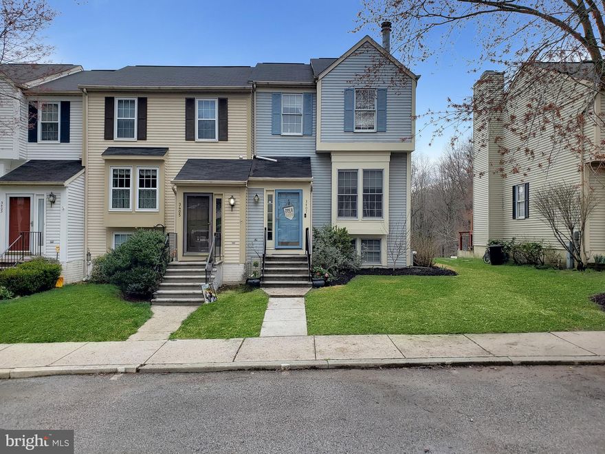 Beautifully updated, well-maintained, and picture-perfect, this true 4 bedroom Oak West end-of-group offers all of the space and amenities you’re looking for, at a Howard County starter home price! *** Step inside the foyer and the first thing you’ll notice is the living room with soaring ceiling, cozy fireplace, and gleaming hardwood floors. *** The spacious dining room overlooks the living room and has a convenient pass-through to the tastefully refreshed kitchen, with new luxury vinyl tile flooring, granite counters, and new appliances. *** Sliders lead to the rear deck, recently painted with built-in seating, it’s the perfect spot to take in the views of the wooded boundary. *** The main level powder room provides ultimate convenience and has been updated along with all other baths in the home with new marble-top vanities with soft-close doors. *** The Primary Bedroom offers all the space you need and is bright and open with vaulted ceilings. *** The Primary Bathroom has been completely renovated with a counter-height vanity, and beautiful tile in modern, neutral tones. *** The upper level is completed with two additional well-sized bedrooms, and a full hall bath that has been updated as well. *** In the lower level you’ll find a true 4th bedroom, complete with closet and large window, and and adjacent powder room. *** The lower level also features a spacious family room, large utility and storage room with laundry center, and additional under-stairs storage. *** The rear  yard sets this home apart, with a lush, level lawn that provides plenty of space for play, all backing to the peacefully wooded common area. *** The Seller-provided home warranty provides up to 14 months of peace-of-mind ownership. ***  Surrounded by modern conveniences, you’ll find casual take out, fine dining, and shopping just a short drive away, or take a walk to the nearby historic district and enjoy the quaint boutiques, antiques and cafes of  Old Ellicott City. *** With the Roger Carter Center’s pool and fitness center just steps away, a local award-winning library, and the neighborhood tot lot, the home’s central location provides easy access to community amenities as well as commuter routes. *** Your Ellicott City townhome search is over!