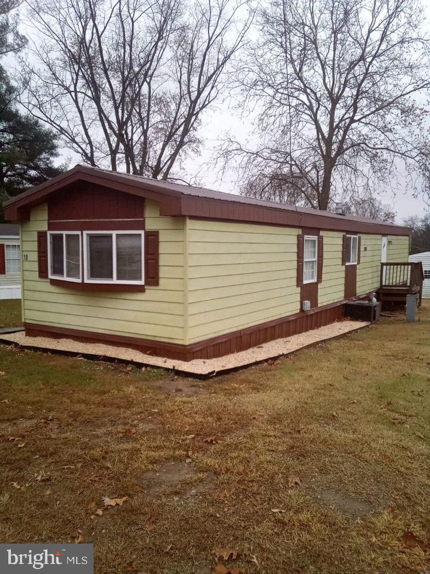 This 2-bedroom one bath manufactured home is located in a friendly park you'll love to call home. The home has a spacious layout and a large storage shed for added convenience. Enjoy comfortable living with propane heat, newer furnace and CAC just 6 years old.  The kitchen is equipped with a refrigerator, stove and washer, dryer. Newer metal roof. BUYER MUST BE PARK APPROVED. Ground rent/park fee is only $420 a month. 
A great opportunity for affordable living in a pleasant community, - don't miss out!