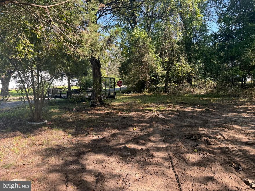 Don't miss your opportunity to buy this land with hook ups in place. Previously land had a 2-bedroom home that was removed. Land is cleared and ready for your imagination. NO HOA