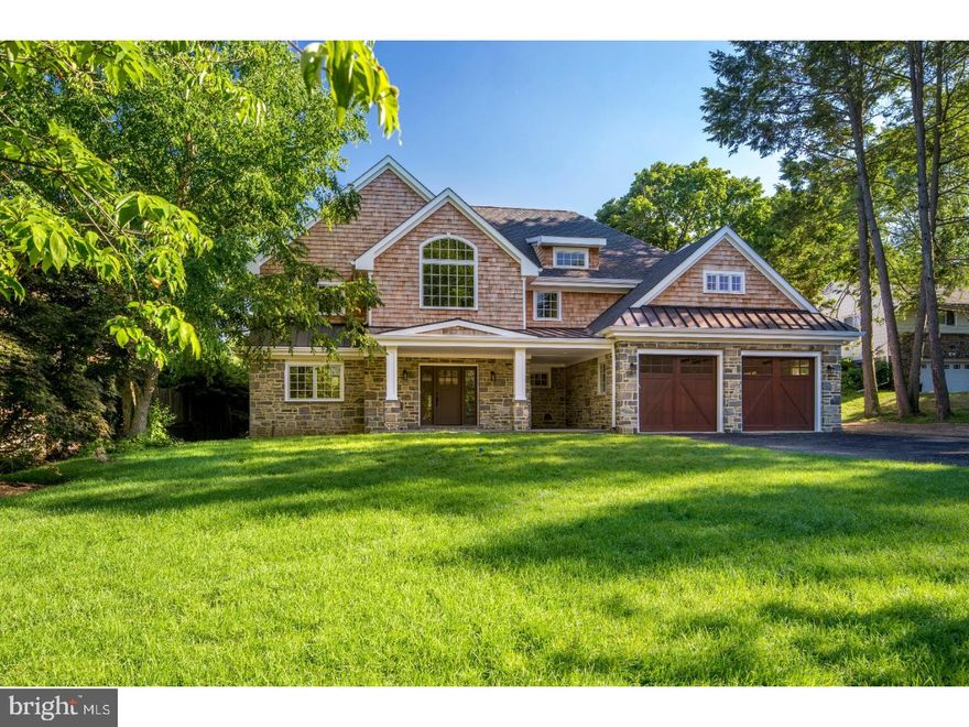 Nothing compares to living in a new construction home designed with superior craftsmanship, detailing & luxurious modern amenities! This incomparable residence sits on a desirable street in a prime location near award-winning Lower Merion schools. The classic stone exterior perfectly complements the stunning .70-acre grounds graced by mature landscaping. Generous windows & French doors invite in brilliant light & showcase lovely views. Beautiful custom millwork, built-ins, site-finished hardwood floors & solid core doors enhance the upscale ambience. A grand 2-story foyer spills into a desirable open-concept floorplan for effortless living & entertaining. Host guests in the elegant living room, formal dining room, library/den, sunroom & state-of-the-art gourmet kitchen. Custom furniture-style cabinetry, quartz counters, premium Thermador appliances & a separate pantry will delight the creative cook. The light-bathed breakfast room opens to a rear stone porch for blissful time in nature. The upstairs master suite overlooks the picturesque property & offers his/her walk-in closets & a spa-like Carrera marble bath featuring his/her vanities, a soaking tub & large shower with radiant heat floor. Four more en-suite BRs & a laundry room complete the upper level. Additional conveniences include a mudroom off the 2-car garage & finished multipurpose lower level for recreation & media rooms, accessing the huge backyard.