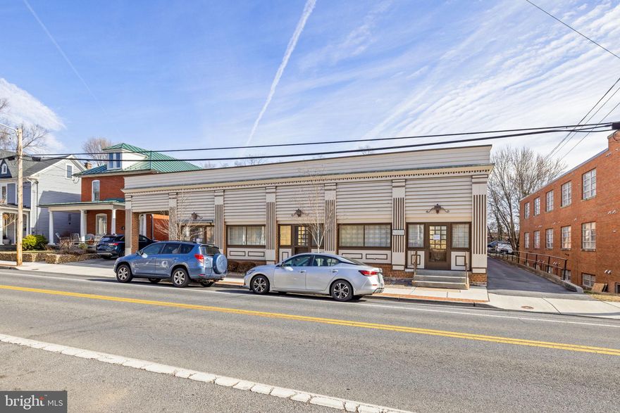 Located in the heart of the historic downtown district, this versatile B1-zoned property offers a rare blend of immediate income and long-term upside. The building features approximately 7,000 SF of office space complemented by 2,000 SF of ground-level shop, supported by 12 on-site parking spaces, important in the urban core. Beyond its current use, the property presents exceptional redevelopment potential, it could be conversion to nine residential units on a single floor and the ability to add up to two additional stories, creating a total of 27 residential units. Ideal for investors or developers seeking a high-visibility downtown location with historic character, flexible zoning, and significant value-add potential.