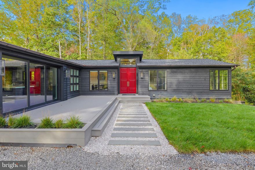 The Lake House on Muddy Creek — A Truly One-of-a-Kind Retreat

Perched on a private 15+ acre lot with sweeping lake views from every angle, this completely reimagined home offers a rare blend of tranquility and jaw-dropping luxury with unmatched convenience.

Key Highlights:

·       Walls of windows + disappearing MultiGlide doors blur the line between indoors and out — perfect for everyday serenity or hosting unforgettable gatherings.

·       Chef’s dream kitchen featuring a 60” WOLF Dual Fuel Range, hidden Sub-Zero fridge/freezer drawers, oversized island, scullery with second dishwasher & fridge, and a perfectly placed wet bar with pass-through to the screened porch.

·       Screened porch with real gas lanterns and premium ipe decking set the tone for magical evenings outdoors.

·       Soaring living room with vaulted ceilings, custom built-ins, and slate fireplace (gas-ready).

·       Main-level primary suite with spa-style bath, marble walk-in shower, floating double vanity, and laundry-ready walk-in closet.

·       Lower level built for fun — radiant heated floors, wood-burning fireplace, huge family/game room, full guest suite, and large laundry/storage room.

Additional Perks:

·       European-style vestibule entry with red doors & custom tile.

·       Stunning guest bath with hand-laid tile & slate walk-in shower.

·       Multiple patios for sunrise & sunset lounging.

·       Wildlife, lake views, and absolute privacy — all just beyond your windows.

You're just:

·       5 minutes to Hartge Yacht Harbor — perfect for Chesapeake Bay boaters.

·       Surrounded by local favorites like Pirates Cove and Stan and Joes Riverside for waterfront dining and relaxed weekends.

·       10–15 minutes to shopping and errands in Edgewater (grocery, Target, restaurants, coffee shops).

·       20 minutes to Downtown Annapolis for dining, festivals, and Naval Academy charm.

·       35–40 minutes to Washington, D.C. — ideal for commuters.

·       Close to major routes (Rt 2, Rt 50, I-97) and 30 minutes to BWI Airport for effortless travel.

If you’ve been looking for true privacy without sacrificing convenience, this home delivers it all — a world away when you’re here, yet minutes from everywhere you need to be.

Coming Soon status may likely change to Active status prior to the date noted in MLS. Additional photos and details will soon be uploaded. Final Walkthrough Tour is now uploaded.