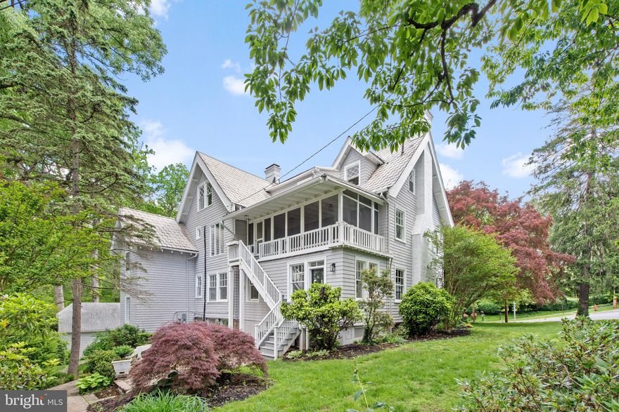 Magnificent and completely renovated  Craftsman style home in the heart of highly sought-after Roland Park. This home offers 6 bedrooms, 4 full and 3 half baths.  According to tax records, the home sits on 1.24+/- acres and offers 5161+/- SF above grade and 2069+/- SF below grade.  
The main level of this home offers an inviting foyer leading to a stunning custom staircase.  The family room offers rich wood board and batten walls and wood beamed ceiling adding to the character and a fireplace completes the room.  The large dining room also offers a fireplace, there are double doors leading to an enclosed four seasons room. The gourmet kitchen offers beautiful white cabinetry, a stunning blue island, marbled quartz counter tops , stainless steel appliances, gorgeous tiled back splash and custom lighting, there is table space, a butler’s pantry (leading to a second staircase) and half bath.  There are two additional flex space rooms.
The second level offers a study/office with built in shelving, an additional updated kitchen, a large bedroom with fireplace, en-suite and walk in closet, the primary bedroom with fireplace surrounded by custom built ins, en-suite with free standing tub and glass shower and access to an enclosed porch.  Another bedroom and half bath.  
Taking those custom stairs to the third and final level, you have 3 bedrooms, 1.5 baths and a laundry room.
The finished lower level offers a large open floor plan, flex space that can be used as a bedroom, study, home gym or craft room with a large walk-in closet, full bath and a utility room.
The lot deep two car detached garage with plenty of space for your vehicles and storage. There is a stone patio area for all your gatherings.