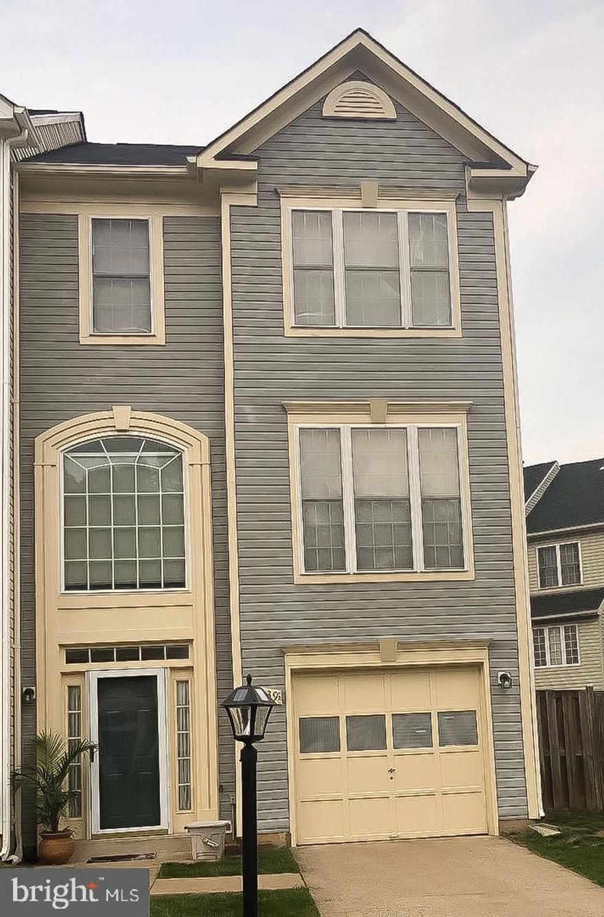 This beautiful 3 Bedroom & 4 Bathroom End-Unit Townhome has everything you could imagine!It features hardwood laminate flooring throughout, lower level has fireplace with access to fenced yard, main level has a large eat in kitchen with island, granite countertops, 42 in cabinets and spacious bump out with access to the large deck.  Master bedroom located on the 3rd level is very spacious with walk-in closet and large windows that allows lots of natural light; master bathroom has dual vanity, separate shower and jetted garden tub.  All of this conveniently located just minutes away from Potomac Mills Mall and walking distance to school, bus stops, and additional shopping.