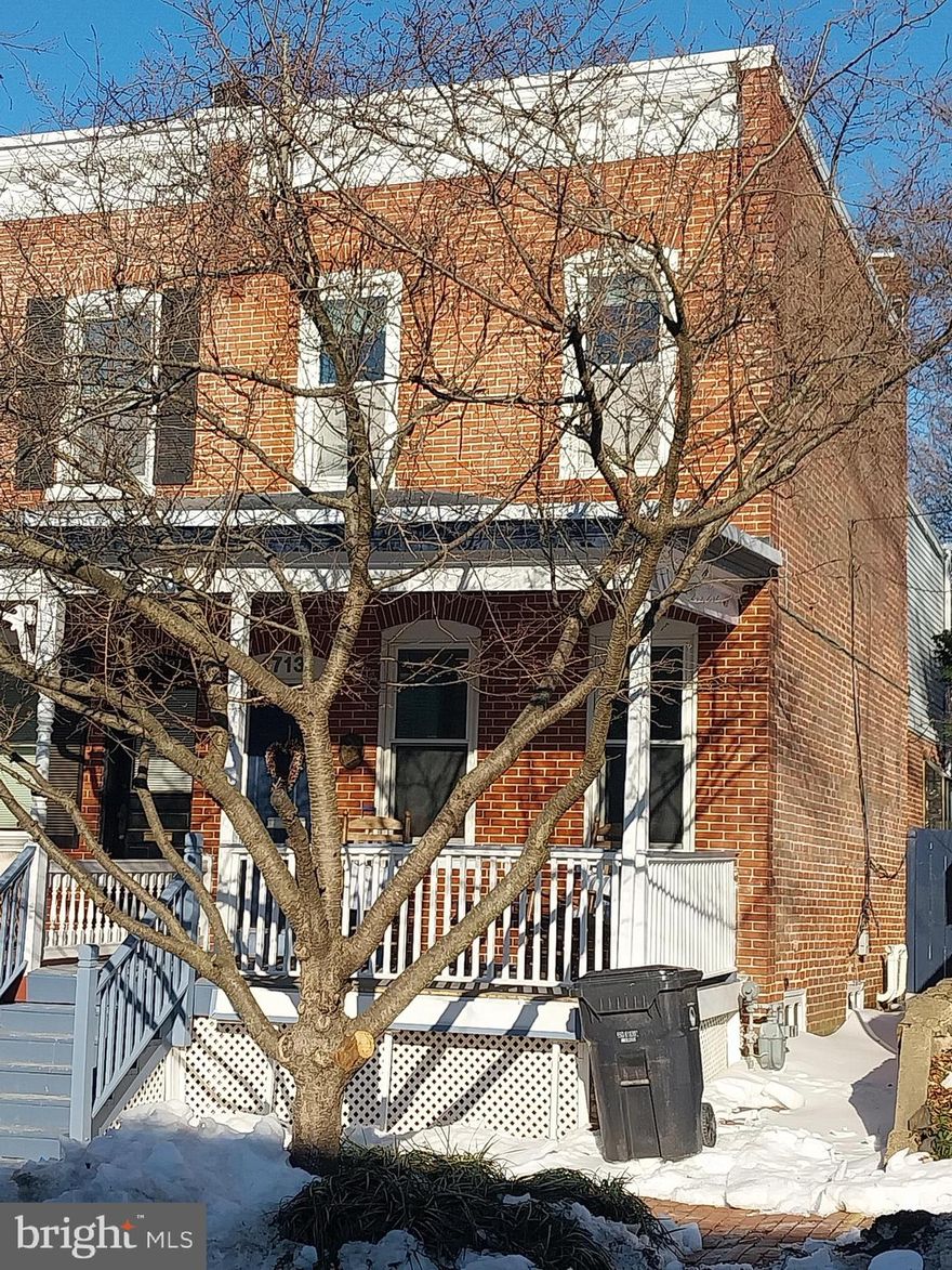 Welcome home! This charming and updated Brandywine Village semi-detached townhouse is two blocks from beautiful Brandywine Park, and convenient to Rodney Square and all of downtown Wilmington. Featuring a newer heating and air-conditioning system (2025), newer water heater (2025), newer built-up roof (2024) and newer bathroom shower stall, this home is ready for today and tomorrow. From the front porch, enter the energy-saving vestibule and through to the two-level living room with tile and wood floors, gas fireplace, high ceilings and a half-turned staircase to the second floor. Pass the under-stair powder room to the dining room with wood floor and display alcove and then to the bright, spacious kitchen featuring LVT flooring, a variety of cabinets, stainless refrigerator and dishwasher, gas stove, double sink, greenhouse window, dining area, skylights, glass wall and sliding glass door to the delightful paved and walled patio. On the second floor, the open den/nursery/office at the top of the stairs has a curved wall and a curved half wall, and a doorway to the good-sized front/primary bedroom, which features a ceiling fan and a double-door closet. The updated hall bath offers an LVT floor, large shower stall and double sinks. The back bedroom has a ceiling fan and a surprise walk-in laundry room/closet with considerable shelving and storage. The basement under the dining and living rooms offers storage space, a second set of laundry plumbing hook-ups, and room for a workbench. This is a lovely house with high ceilings upstairs and down, recessed lighting, decorative and unexpected features, ample windows and light, and the system updates today’s buyers are looking for.